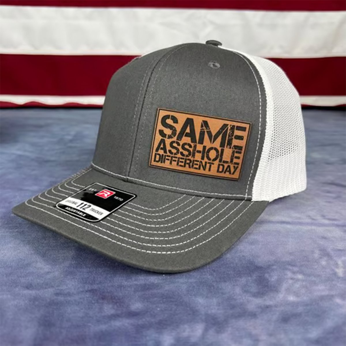 SAME ASSHOLE DIFFERENT DAY Hat
